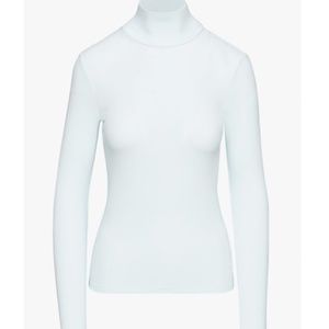 light blue turtleneck top